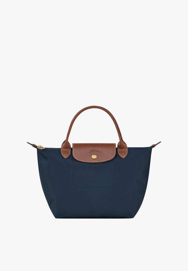 Navyblaue Tragetasche aus strapazierfähigem Nylon, mit einem strukturierten braunen Lederobergriff und Akzenten sowie einem goldenen Druckverschluss.