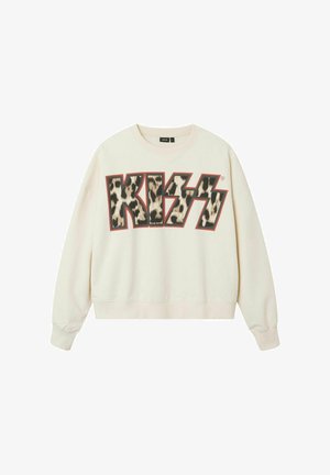 Krēmas krāsas pelēkās krekls ar vaļīgu piegriezumu, ar bloku "KISS" logo leoparda rakstā un sarkanu apmalīti. Ribotās piedurknes un apakšmala.