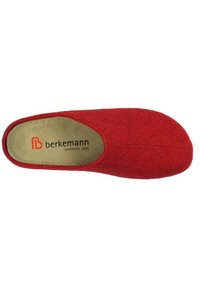 Red felt slipper with a rounded toe, open heel, and padded insole featuring the brand name "berkemann" in black on a tan background.