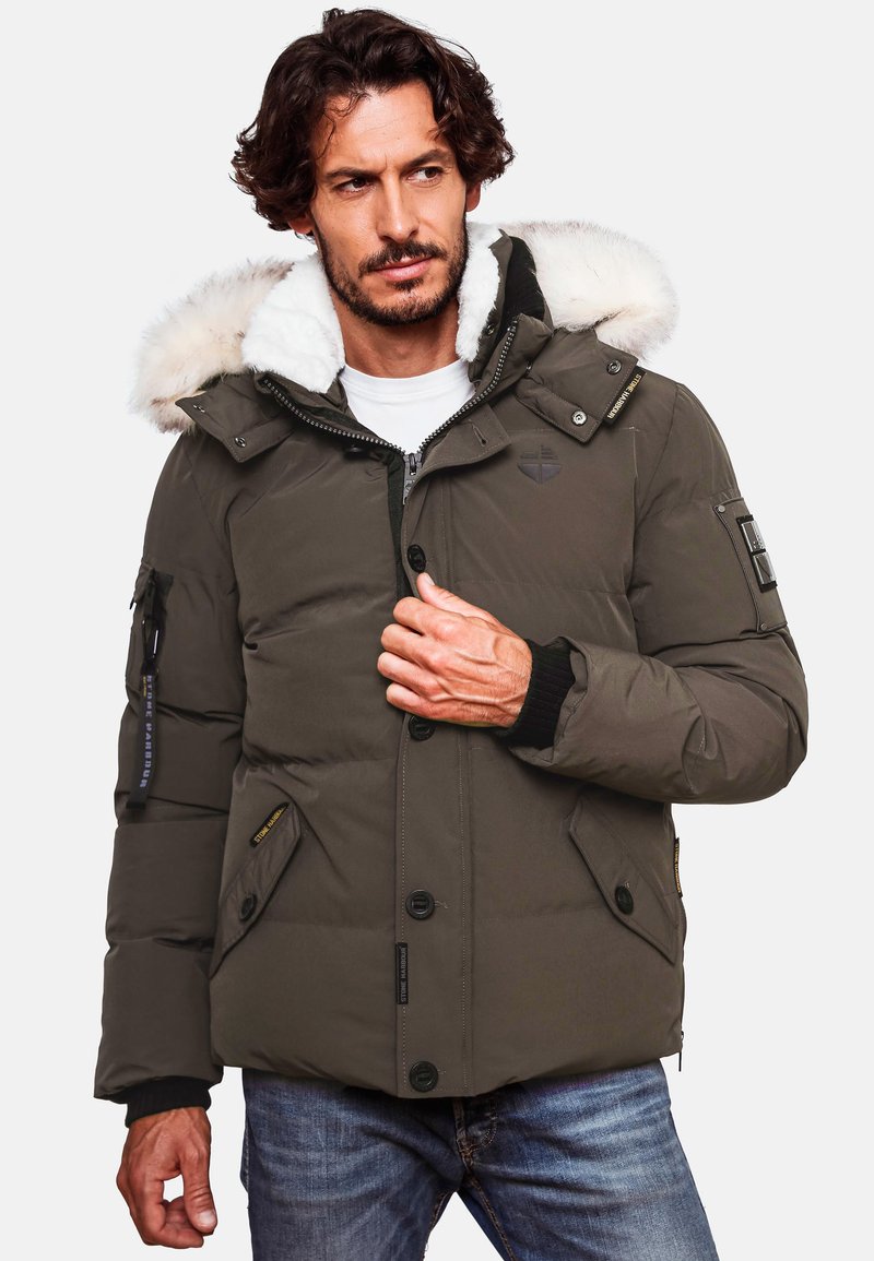 Olive green puffer jacket with a removable faux fur hood, zip and button closure, multiple pockets, and ribbed cuffs.
