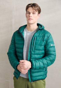 Champion ICONS LIGHT HOODED JACKET - Chaqueta de invierno - green/black