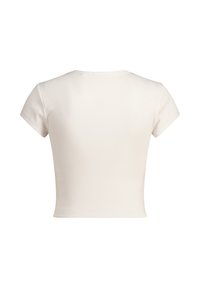 T-shirt bianco a maniche corte con scollatura rotonda. Il tessuto ha un aspetto texture e aderenza in vita.