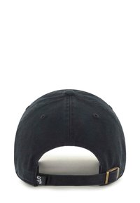 Black cotton cap with a rounded shape, curved visor, reinforced stitching, and adjustable strap featuring a gold metal buckle on the back.