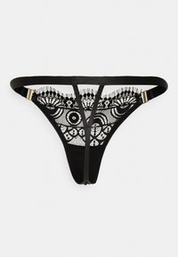 Fio dental de renda preta com padrão floral intricado e detalhes finos. Apresenta tiras pretas finas e acessórios em tom dourado.