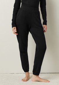 Next REGULAR FIT  - Pantalones deportivos - black
