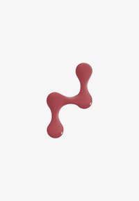 Objet abstrait rouge, lisse, avec trois extrémités bulbées reliées par des segments tubulaires courbés sur un fond gris clair.