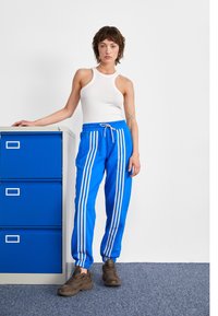 adidas Originals ADICOLOR 70S - Donji dijelovi trenirke - bluebird