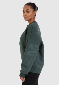 Smilodox UNISEX BRAIL SOLID - Sudadera - grün