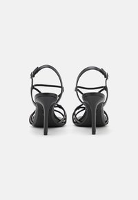 Tamaris Korolliset sandaalit - black