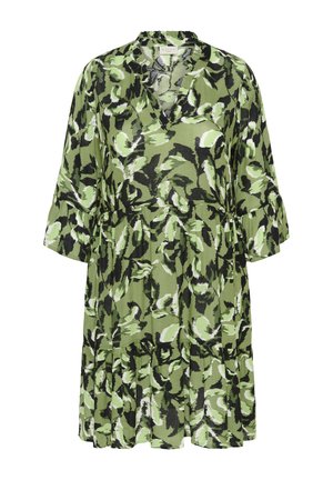 Bloemrijk jurk in schakeringen van groen en zwart. V-hals, driekwart mouwen en een zwijgende tiered zoom. Lichtgewicht stof.