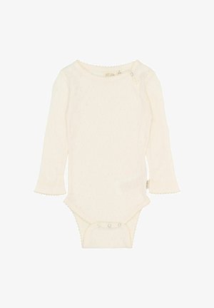 Langærmet bomuldsbodysuit i cremefarve med tekstureret mønster og bølgede kanter. Trykknapper i bunden for nem omklædning.