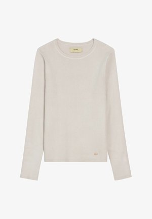 Jasnobeżowa, prążkowana koszulka z długim rękawem i okrągłym dekoltem. Zawiera subtelny akcent złotego logo przy dolnym brzegu. Miękka tekstura i dopasowany krój.