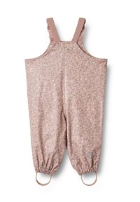 Des salopettes roses à motif floral avec des bretelles réglables, des poignets élastiques et des boucles latérales, fabriquées dans un matériau léger et flexible.