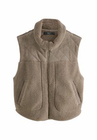 Béžová fleece vesta s vysokým golierom, prešívanou textúrou na hornej časti a plyšovou spodnou časťou, ktorá má dve bočné vrecká a predný zips.