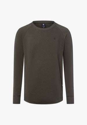 Olive green koszula z długim rękawem z teksturowanej tkaniny, z okrągłym dekoltem, rękawami raglanowymi i subtelnym logo na piersi.