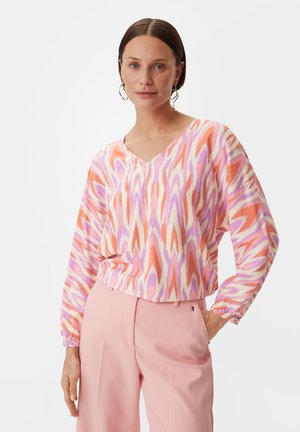 Mehrfarbige V-Ausschnitt-Bluse aus leichtem Stoff mit einem abstrakten Muster in Pink, Orange, Weiß und Lila. Lange Ärmel mit elastischen Bündchen.