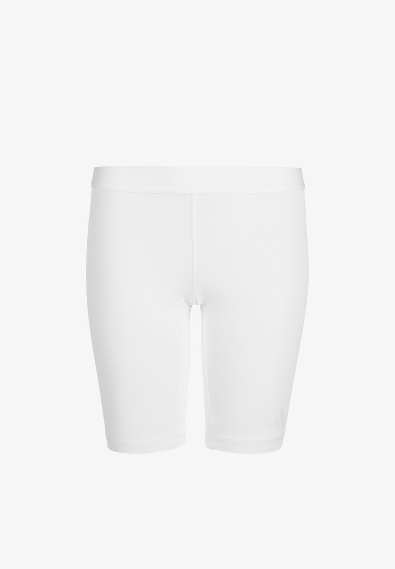Weiße Sportshorts mit eng anliegendem Design, hergestellt aus einem glatten, elastischen Stoff. Mit einem weichen Bund und minimaler Markenkennzeichnung an der Seite.