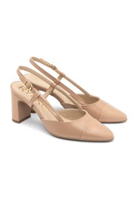 Beige slingback hakken met een spitse neus, blokhak en twee banden. Gemaakt van soepel leer, met gouden branding op de binnenzool.