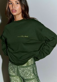 Never Fully Dressed Sudadera - green