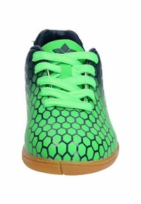 Πράσινα αθλητικά παπούτσια με εξαγωνικό σχέδιο, υφασμάτινο άνω μέρος με υφή και επίπεδα κορδόνια. Ραφινάνη σόλα με γυαλιστερό φινίρισμα χρώματος καραμέλας.
