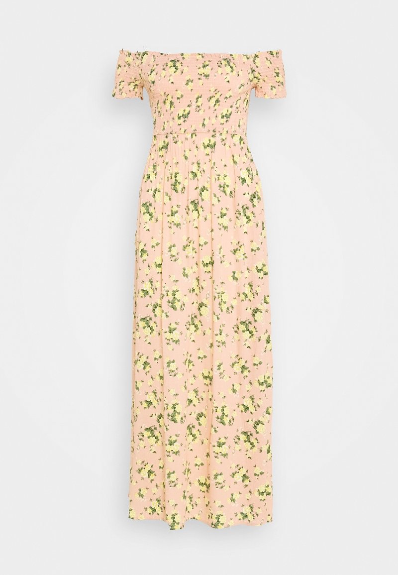 Robe maxi rose, épaules dénudées, manches courtes et petit motif floral jaune et vert.