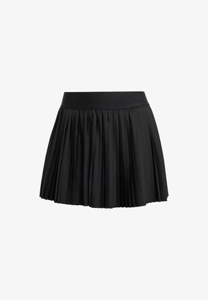 Must mustriga seelik elastse vöökoha ja tekstuurse kangaga, millel on kihiline disain, mis loob hemmi ääres volüümi.
