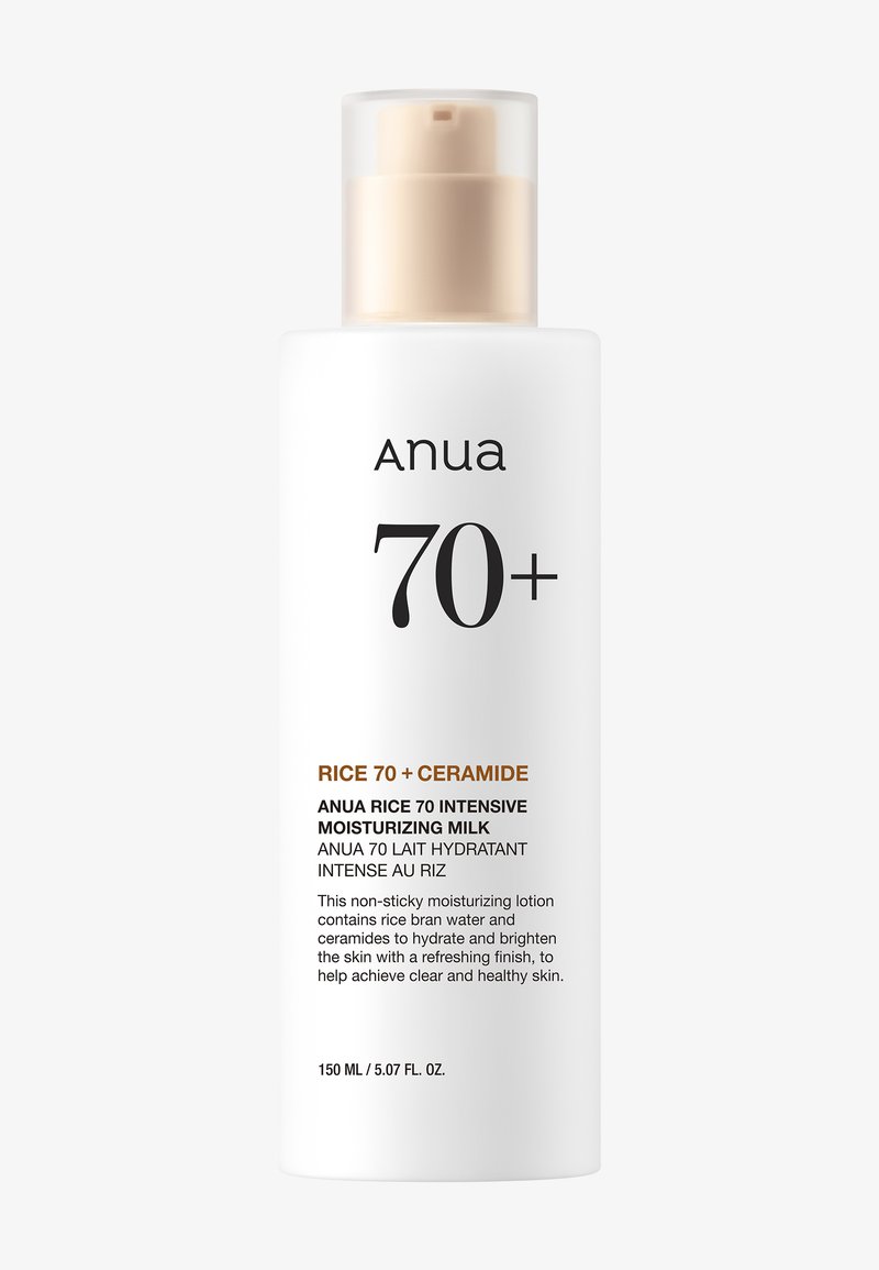 200 ml weiße Flasche Anua Rice 70+ Ceramid feuchtigkeitsspendende Milch mit beigem Pumpspender vor weißem Hintergrund.