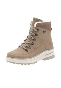 Botas de senderismo de gamuza marrón claro con un cuello de piel sintética blanca, ojales de metal y cordones con estampado. Suela gruesa blanca con un dibujo resistente para mayor tracción.