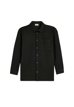 Chemise noire à manches longues avec col, fermeture à boutons sur le devant et une poche poitrine. Fabriquée dans un tissu texturé avec une coupe ajustée.