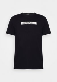 Czarny bawełniany t-shirt z białym prostokątnym logo z napisem "JUSTCAVALLI" wyśrodkowanym na klatce piersiowej. Krótkie rękawy i okrągły dekolt.