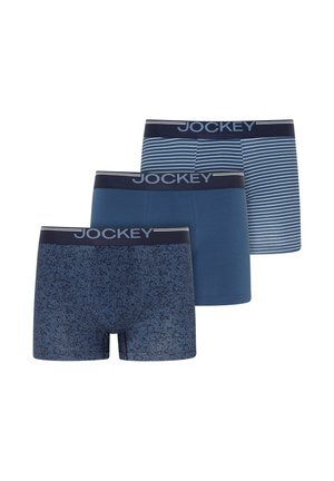 Three pairs of men's boxer briefs in blue tones, one solid, one with stripes, and one with a floral pattern, all with black waistbands labeled Jockey.