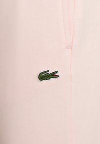 Lacoste Sport PANT - Calças de fato de treino - flamingo