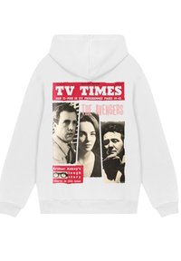White hoodie featuring a vintage magazine cover design with black-and-white portraits and bold red text. Notable details include a texture resembling print.