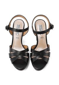 Sandali neri con cinturini incrociati, cinturino alla caviglia regolabile, texture in pelle liscia e soletta imbottita.