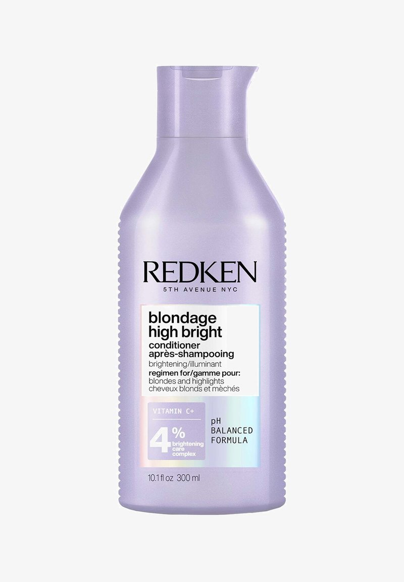 Paarse plastic fles van Redken Blondage High Bright conditioner, met een flip-topdeksel, een heldere label met zwarte tekst en zilveren accenten.