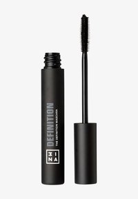 Tubetto di mascara nero con finitura opaca, con testo bianco sulla parte anteriore. Include un lungo applicatore nero con setole fitte per l'applicazione.