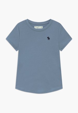 T-shirt enfant manches courtes bleu clair uni avec col rond et petit logo élan foncé sur la poitrine gauche.