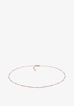 Collier délicat en chaîne en or rose avec de petites perles sphériques espacées régulièrement et un fermoir mousqueton avec une extension réglable.