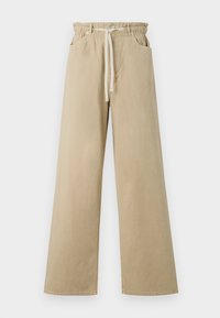 Beige brede bukser laget av bomull med elastisk liv og snøring. Har to sidelommer og en glatt tekstur.