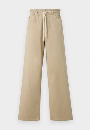 Bež hlače širokih nogavica od pamuka s elastičnim pojasom i vezicom. Sadrže dva bočna džepa i glatku teksturu.