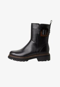 Wybrany, black leather