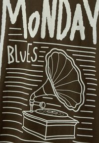 Texte "Monday Blues" avec un gramophone vintage jouant un disque vinyle, tout en art linéaire blanc sur un fond sombre.