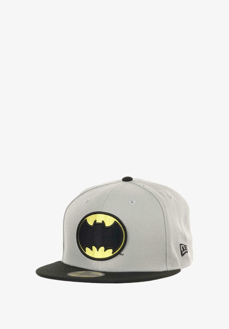 Gray baseball cap with a black visor, featuring a large yellow and black Batman logo embroidered on the front. Black accents on the top button.