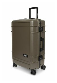 Hard-shell suitcase in olive green, featuring a textured surface, retractable handle, two combination locks, and four black wheels for mobility.
