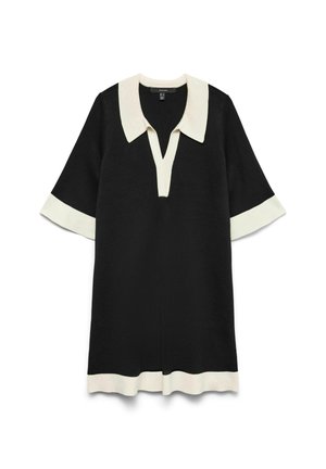 Black dress with a white collar and cuff accents, featuring a v-neckline, short sleeves, and a straight cut. Soft, knit fabric texture.