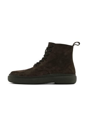 Dark brown suede lace-up ankle boot with pull tab and thick black sole, side view on a white background.