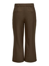 Pantalon marron à jambes larges et coupé avec taille élastique et poches passepoilées à l'arrière, présenté sur fond blanc.