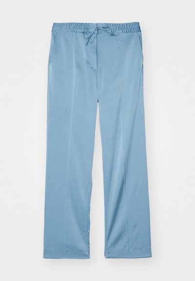 Light blue, wide-leg pants made from soft fabric. Features an elastic waistband with adjustable drawstring and side pockets.