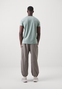 ICANIWILL TRAINING MEN - Camiseta deportiva - racing green