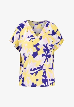 Short-sleeve blouse in lightweight fabric featuring a yellow, purple, and pink floral pattern with a V-neck design and loose fit.